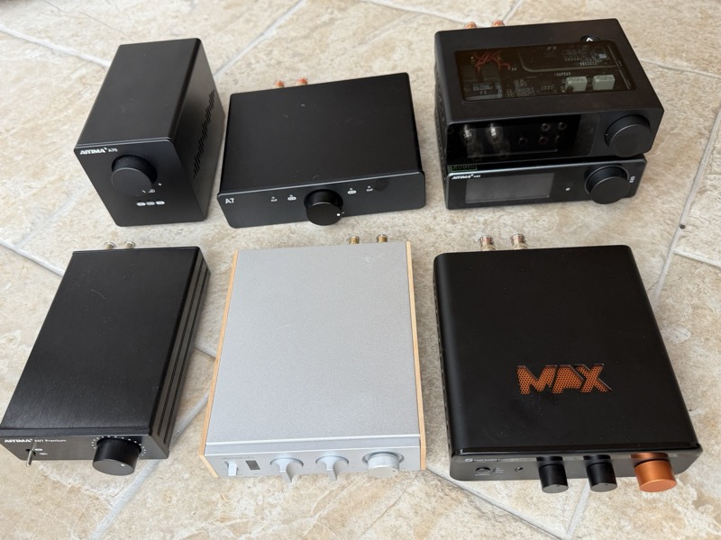 class D amplifier comparison lineup front view — Aiyima A70, 3E Audio A7, Aiyima A80 with Ampapa D1, Aiyima A07 Premium, Jade Audio Level 1, Fosi BT20A Max