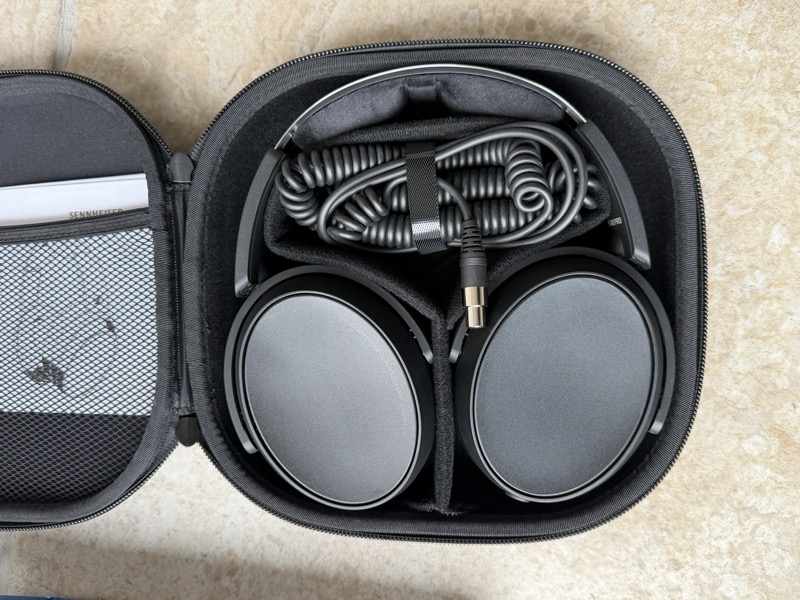 case with cables and earpads